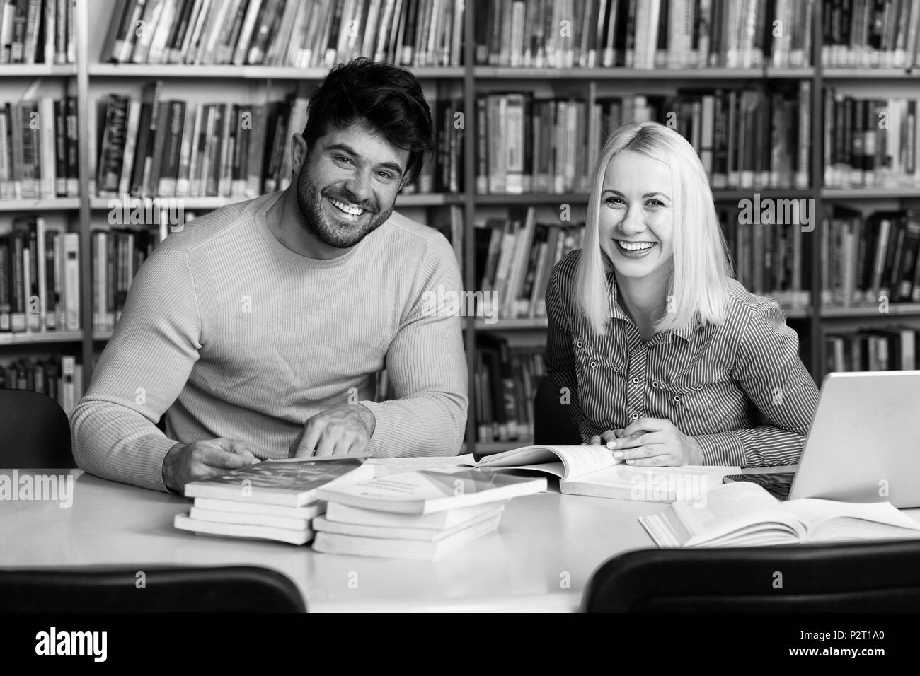 Students Preparing Exam and Learning Lessons in School Library Making ...