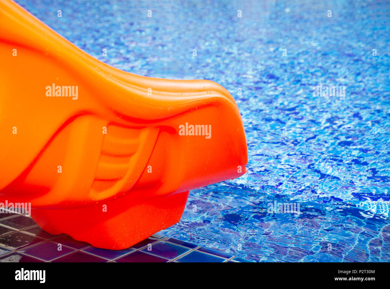 Orange pool slider Stock Photo Alamy