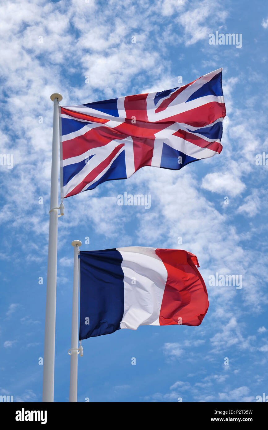 The Flags of the United Kingdom and France. The British Union Jack and the French Tricolor. Stock Photo