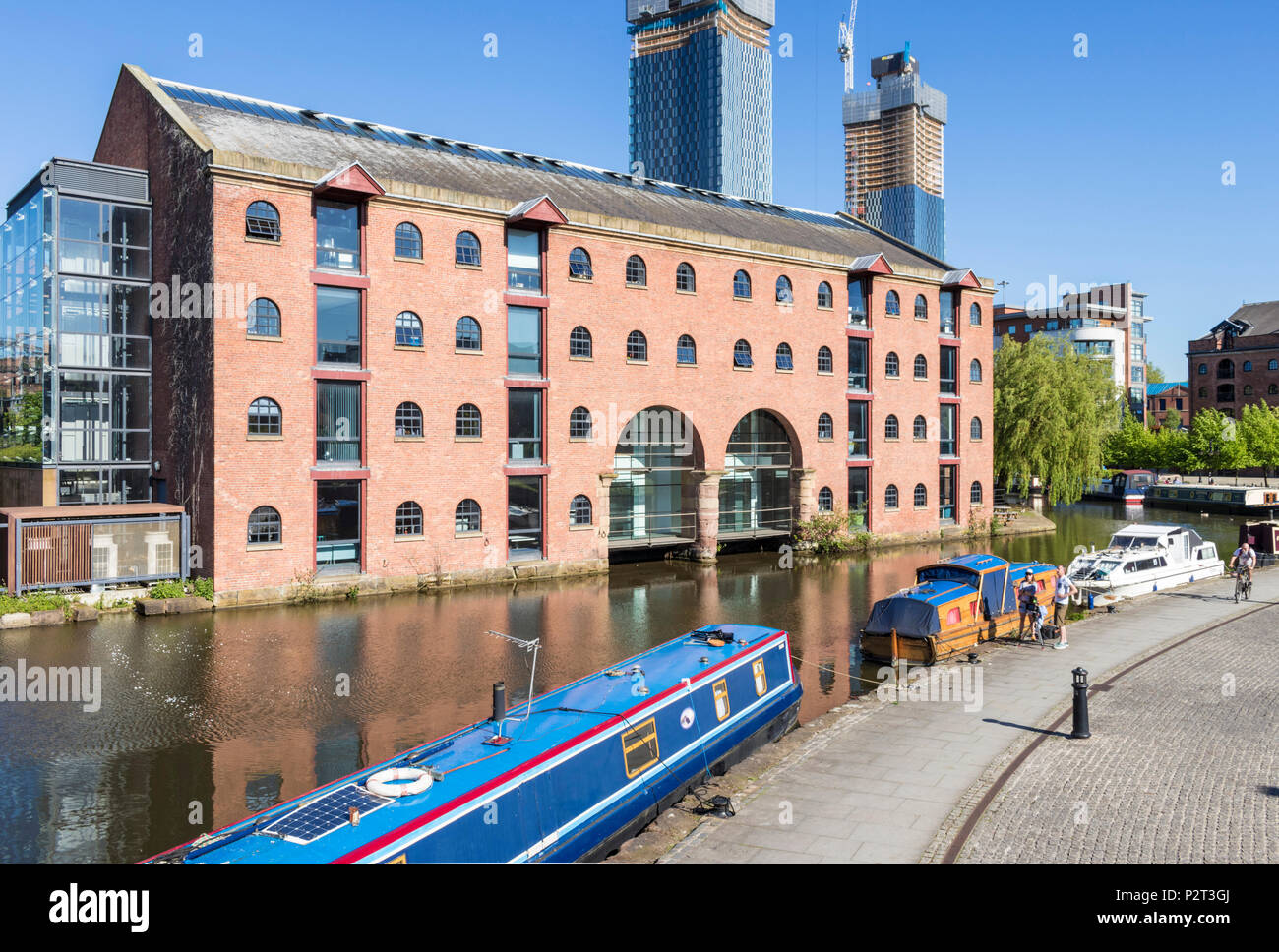 England Manchester England greater Manchester City centre city center view of the beetham tower and bridgewater canal with narrow boat manchester uk Stock Photo