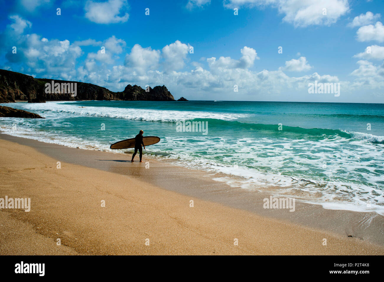 porthcurno-beach-with-a-surfer-stock-photo-alamy