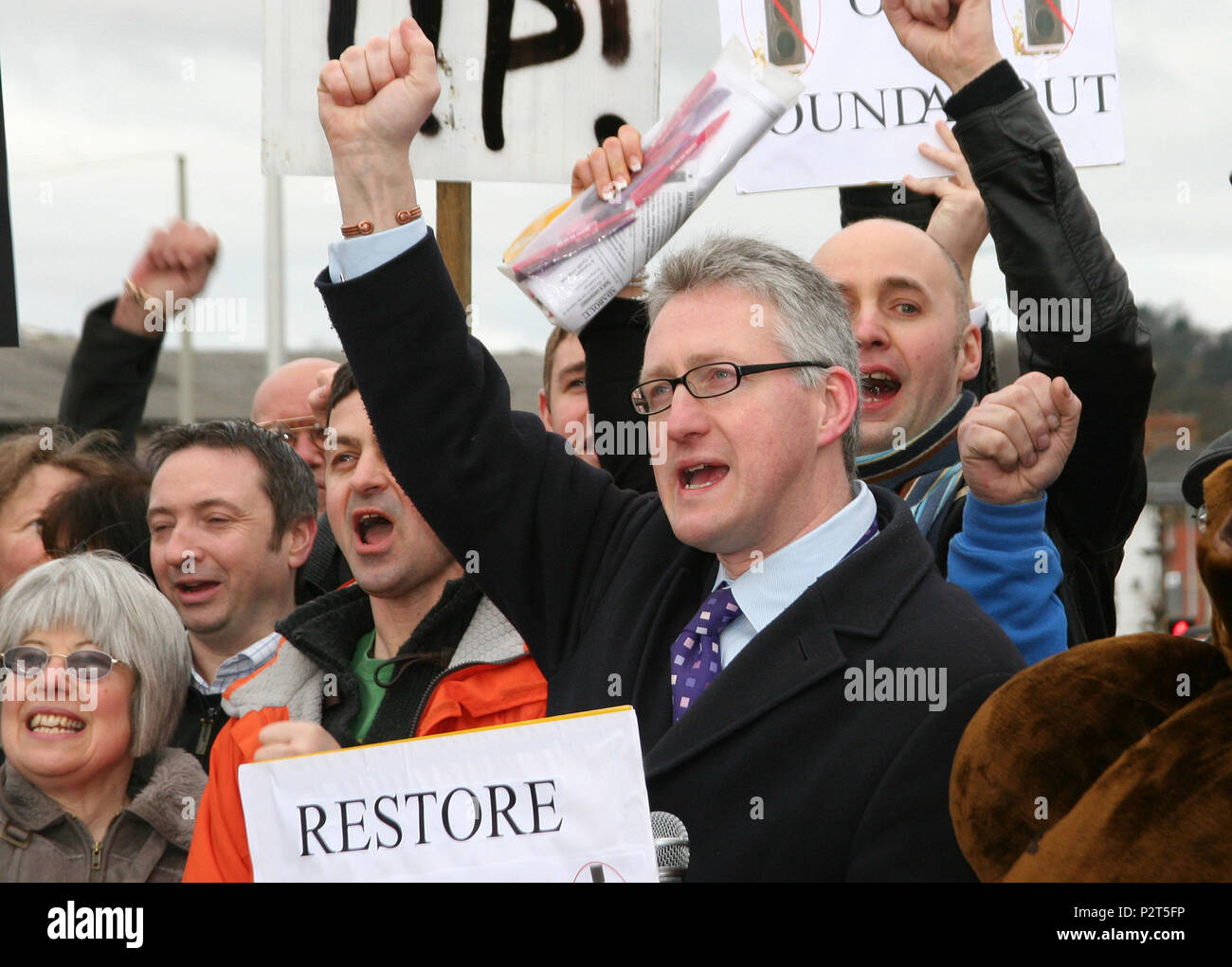 Lembit Opik MP; hand raised; clenched fist; riding high at a protest meeting in Mid Wales. A few months before losing his seat in the general election Stock Photo