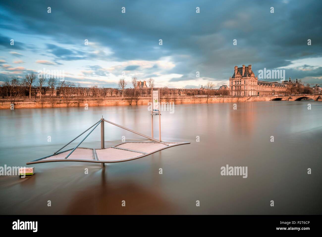France, Paris, the banks of the Seine river listed as World Heritage by UNESCO, flood of the Seine river (january 2018), Port Solferino, Musée d'Orsay Batobus station and Le Louvre Museum in the background Stock Photo