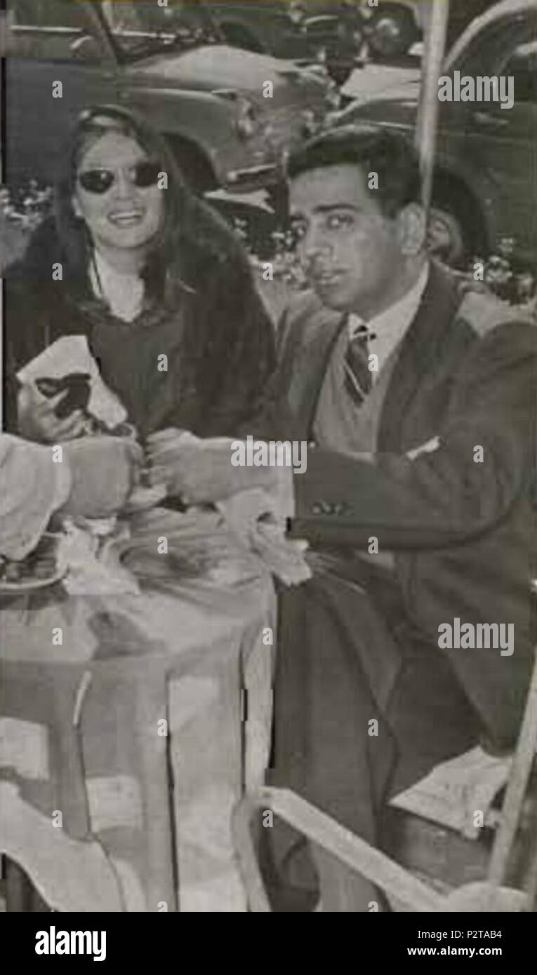. Eva Bartok and Prince Shiv Of Palitana in a bar of Via Veneto in Rome . 1959. Unknown 26 Eva Bartok and Prince Shiv Of Palitana Stock Photo