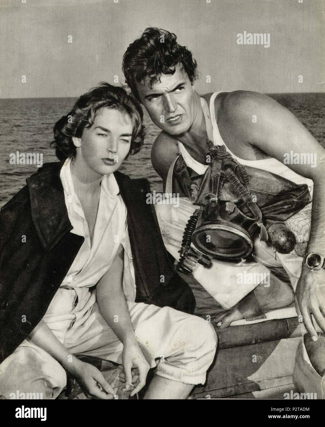 . Dawn Addams and Franco Silva the Italian film Mizar (Sabotaggio in mare) directed by Francesco De Robertis. Released in the UK as Frogman Spy; in the US as Frogwoman or The Woman Who Came from the Sea . 1953. Francesco De Robertis / Carlo Bellero 21 Dawn Addams and Franco Silva Stock Photo