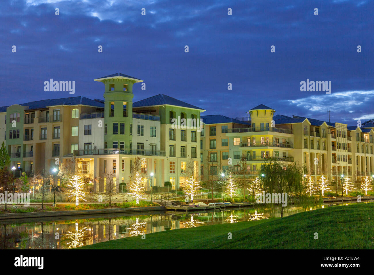 Beautiful night lighting in December on the Woodlands Waterway, in The Woodlands, Texas. Stock Photo