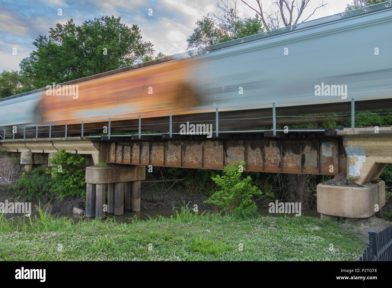 train speeding of a bridge, motion blur Stock Photo