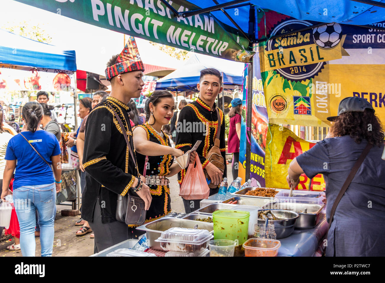 Kadazan and Dusan in traditional clothing at Pesta Kaamatan or harvest