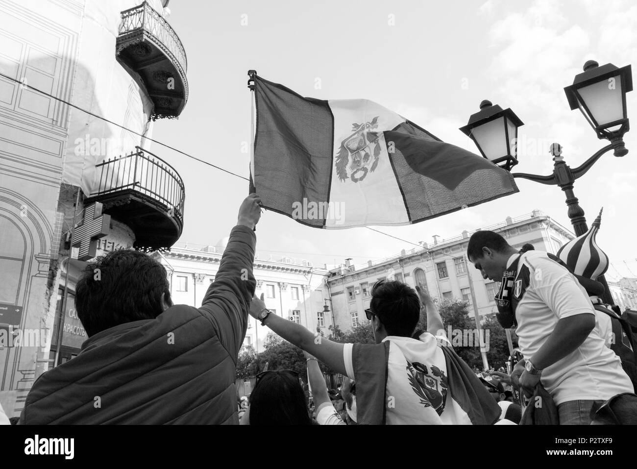 MOSCOW, RUSSIA - 13 JUNE, 2018: Black and white picture of peruvian supporters partying in the streets of Moscow for the World Cup, Russia Stock Photo