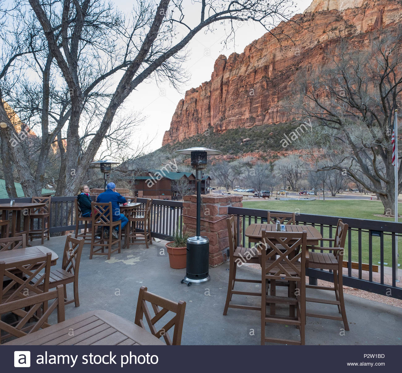 People Sitting At Tables On Outside The Red Rock Grill Zion