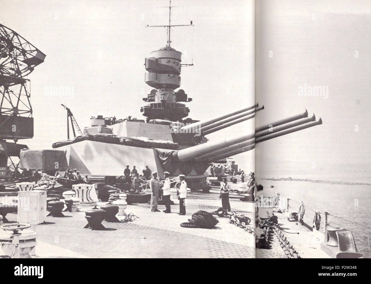 . English The forward triple 50caliber gun turrets of the Italian dreadnought battleship Roma