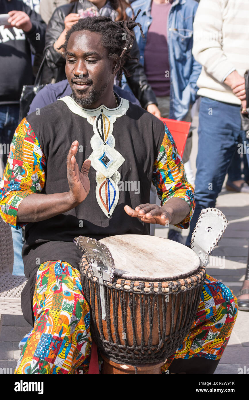 Chieti, Italy - 08 April 2018: African percussionist plays on the street during a city festival Stock Photo