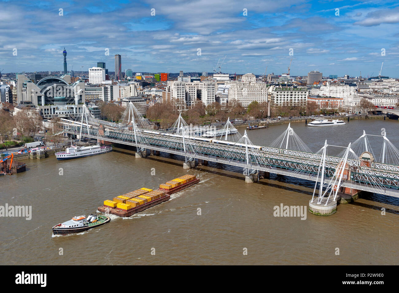 Aerial view of Hungerford Bridge, and Golden Jubilee Bridges, two cable-stayed pedestrian bridges over the River Thames in London, England, UK Stock Photo