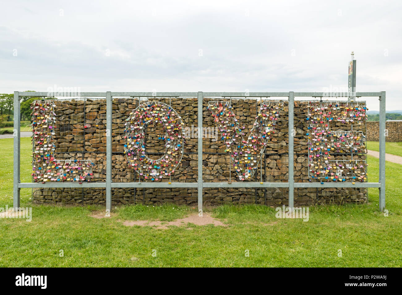 Love installation 'wall of love' made up of love padlocks at Gretna Green, Scotland, UK Stock Photo