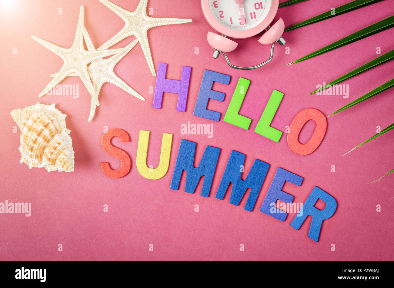 Hello summer wood text with bright color on beautiful background. Stock Photo