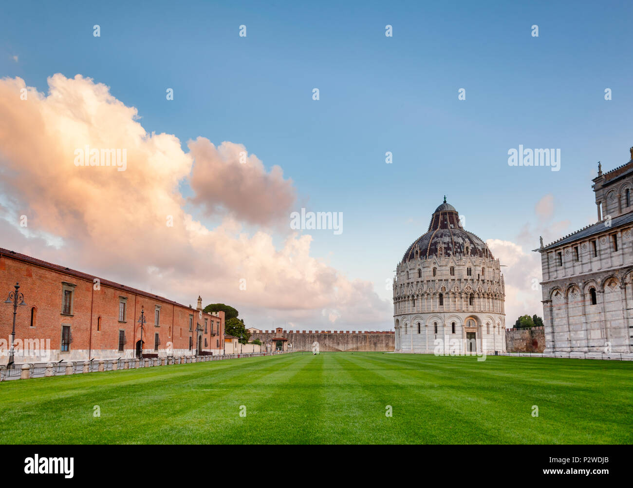 Piazza dei Miracoli (Square of Miracles) or Piazza del Duomo (Cathedral Square) with Pisa Baptistery and Pisa Cathedral in the morning light, Pisa, Tu Stock Photo