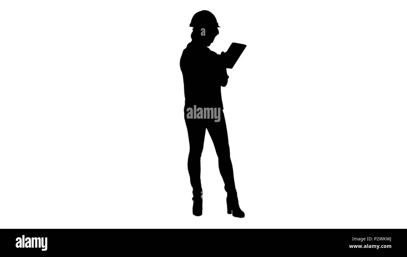 Silhouette Asian engineer woman using tablet track matte Stock Photo