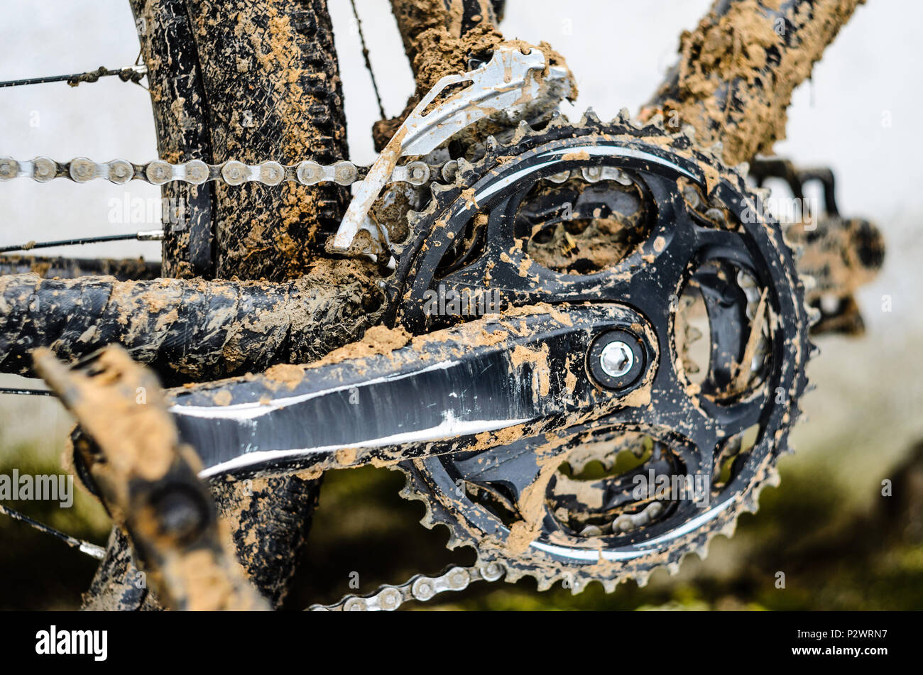 Mountain Bike Transmission in Mud. Dirty Chain Drive of Mountain Bike After  Riding in Bad Weather Stock Photo - Alamy