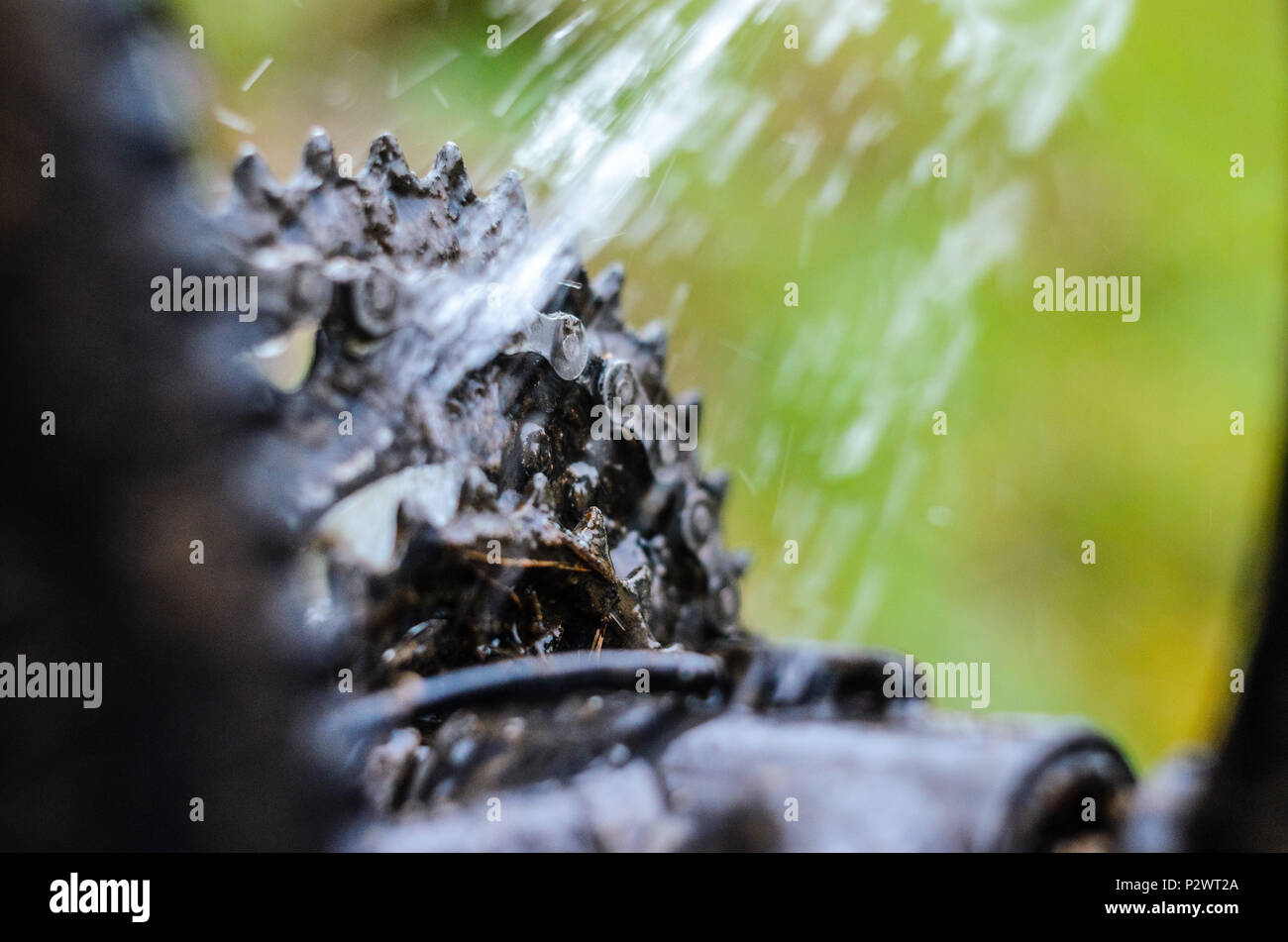 Washing the Transmission of a Mountain Bike with a Water Jet, CloseUp