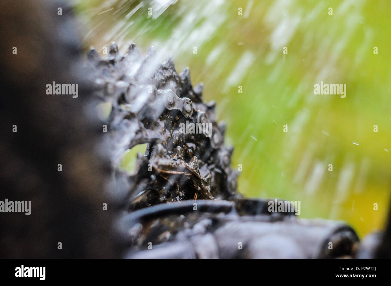 Washing the Transmission of a Mountain Bike with a Water Jet, CloseUp