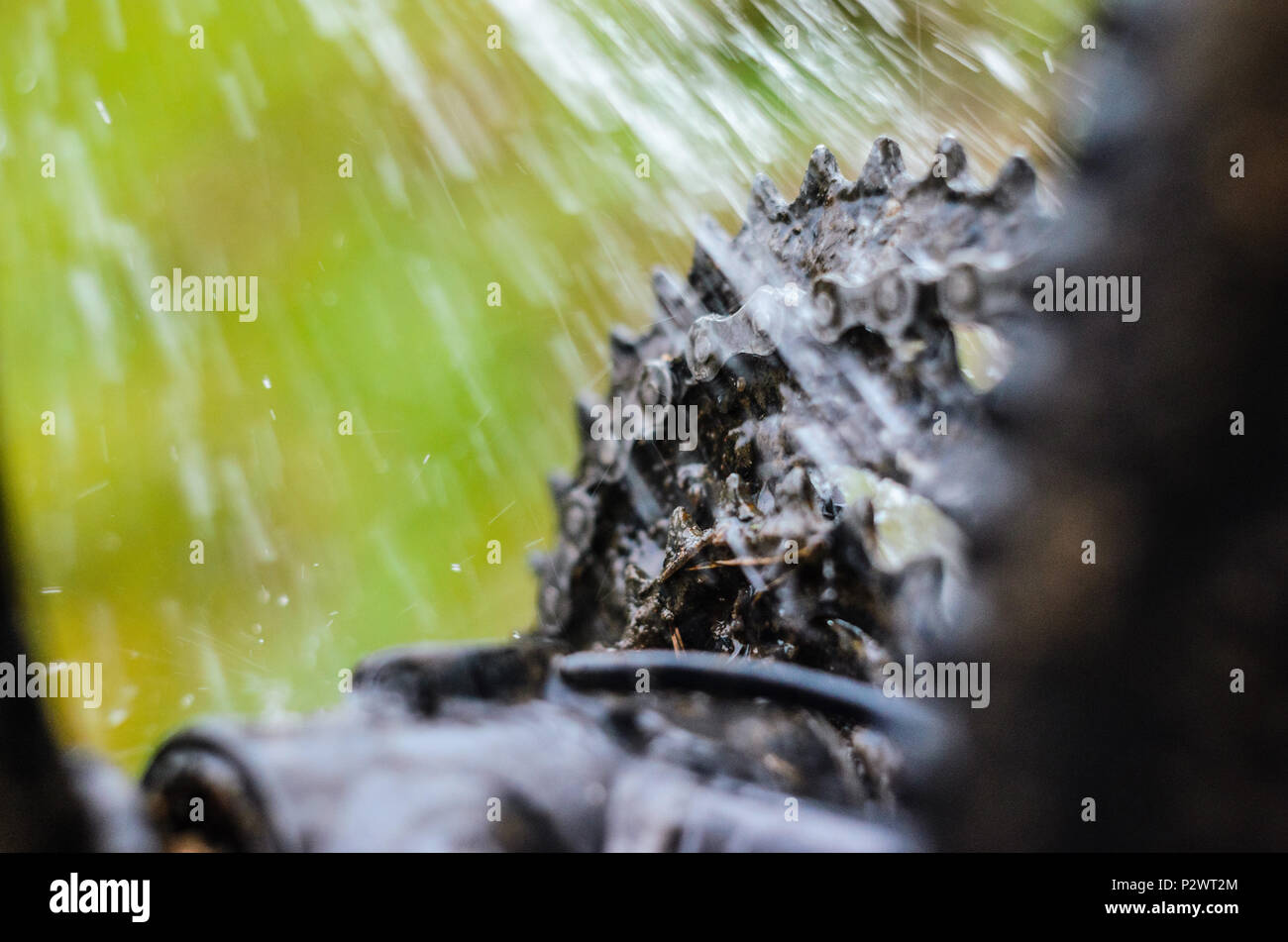 Washing the Transmission of a Mountain Bike with a Water Jet, CloseUp