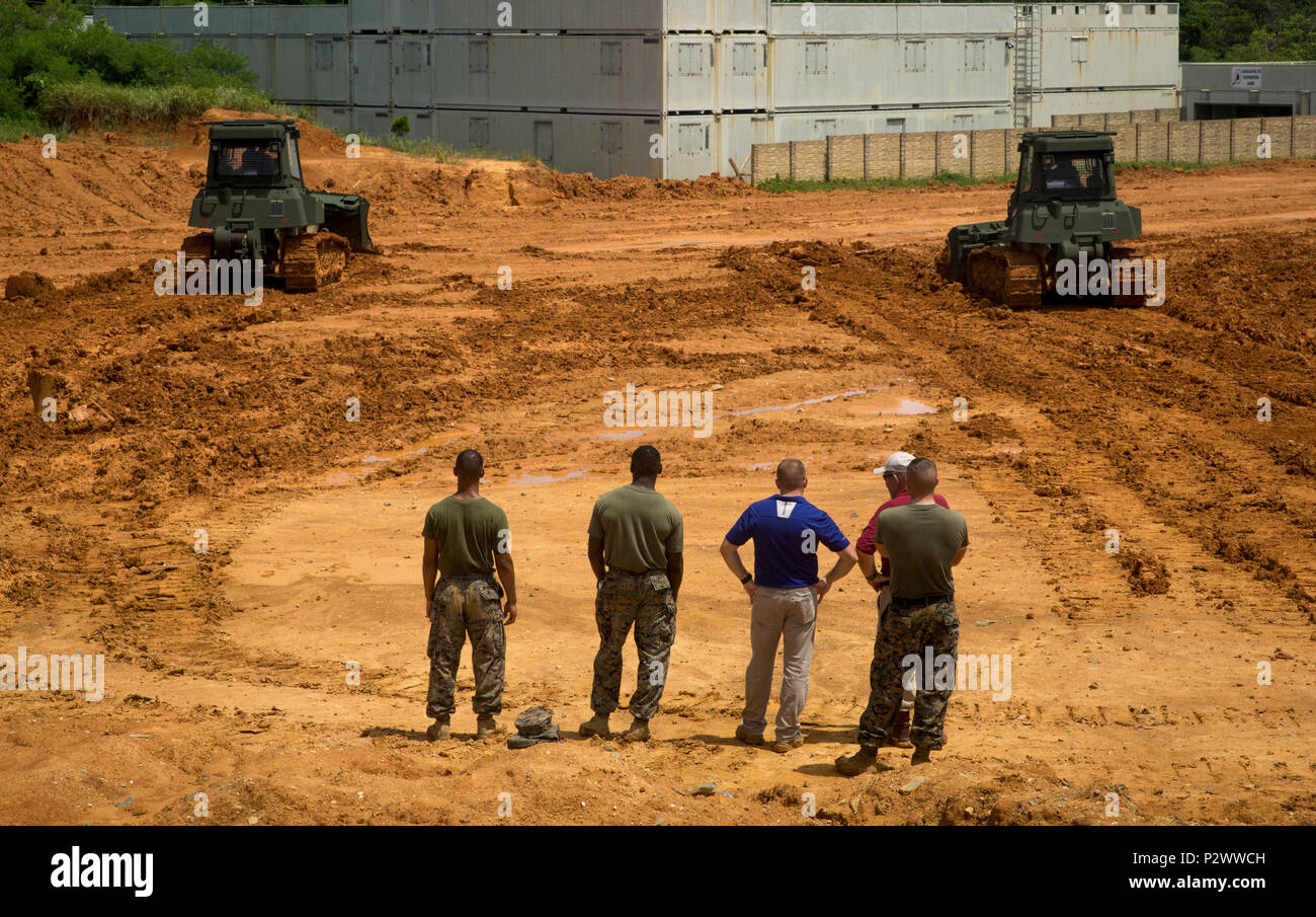 Instructors watch over marines learning how to operate d6k light hires