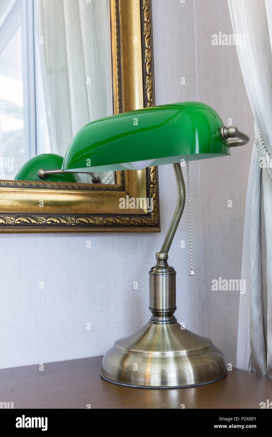 Vintage green desk lamp in luxury room Stock Photo - Alamy