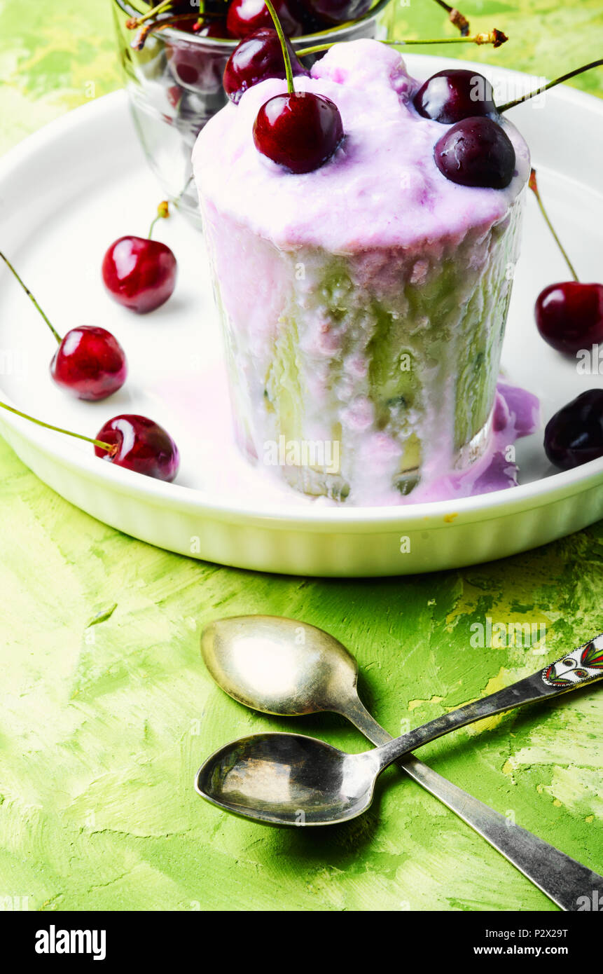 Glass of summer ice cream with cherry flavor Stock Photo