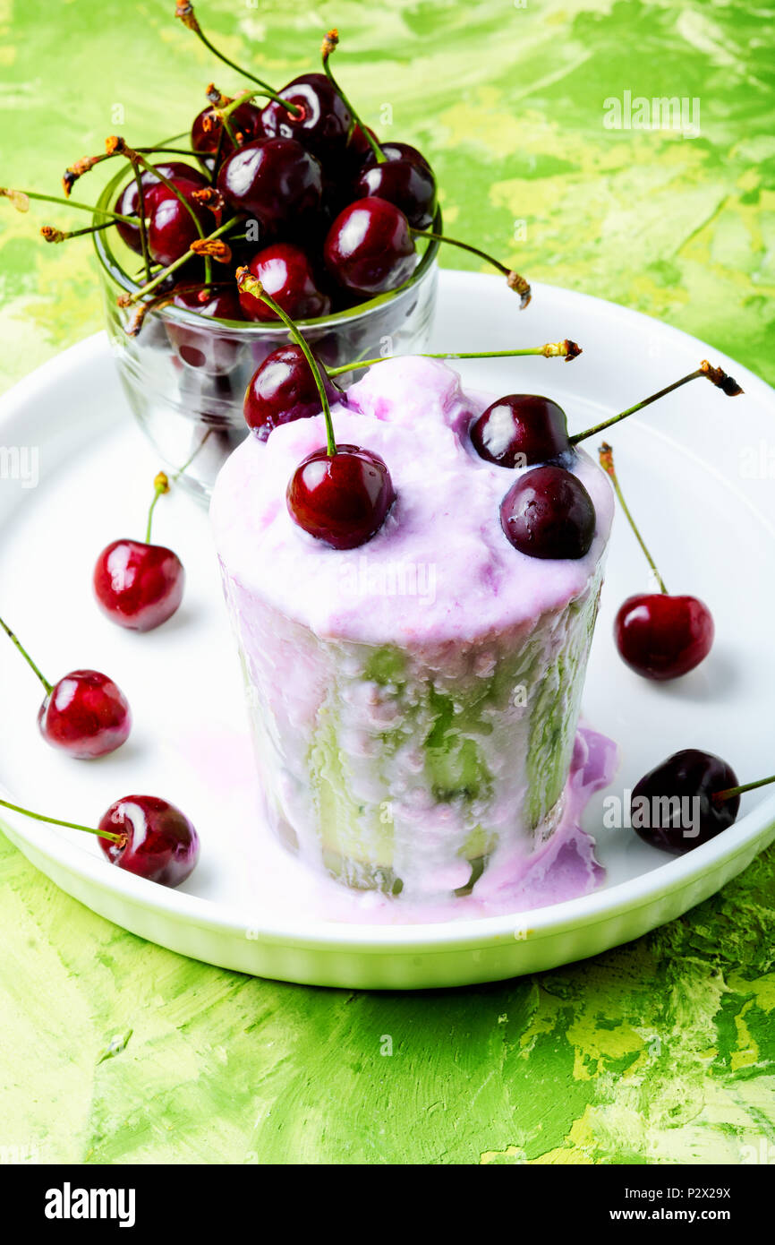 Glass of summer ice cream with cherry flavor Stock Photo