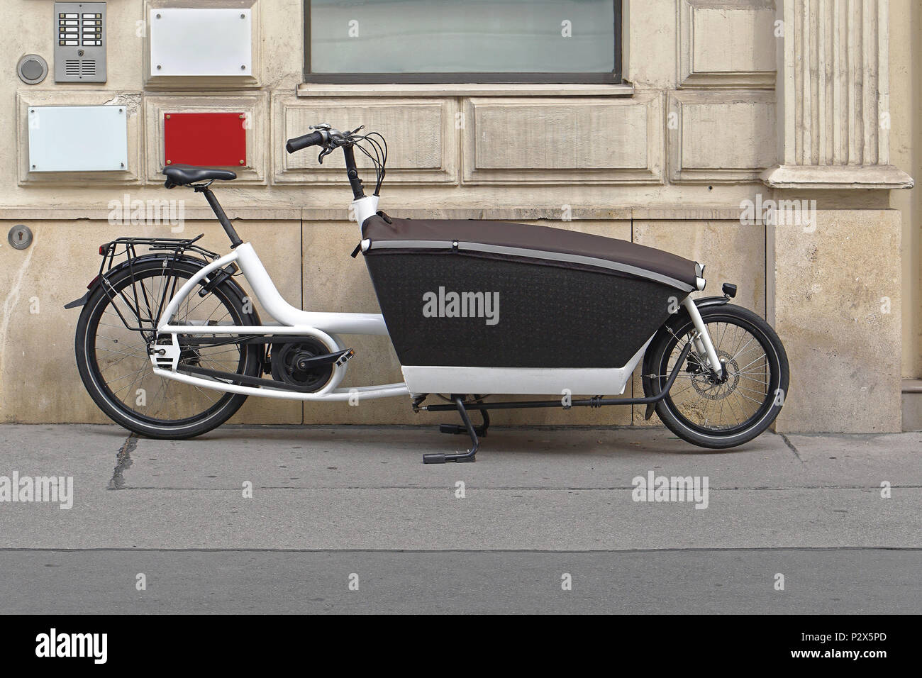 Transport bicycle with big cargo box Stock Photo - Alamy