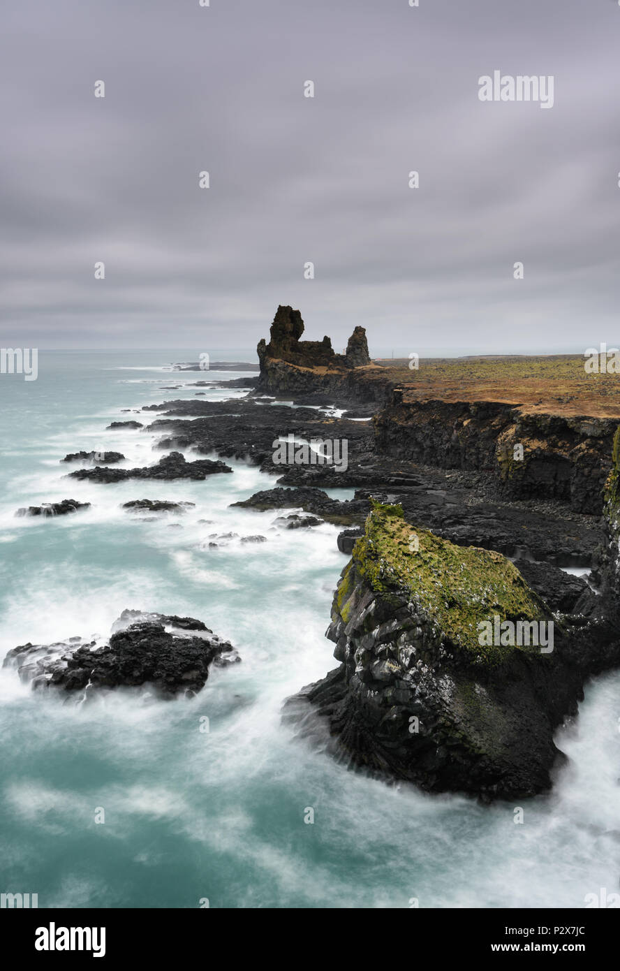Northern cost of Iceland. Amazing Icelandic landscape at Londrangar Cliffs. Beautiful seascape in Iceland. Travel picture. Stock Photo