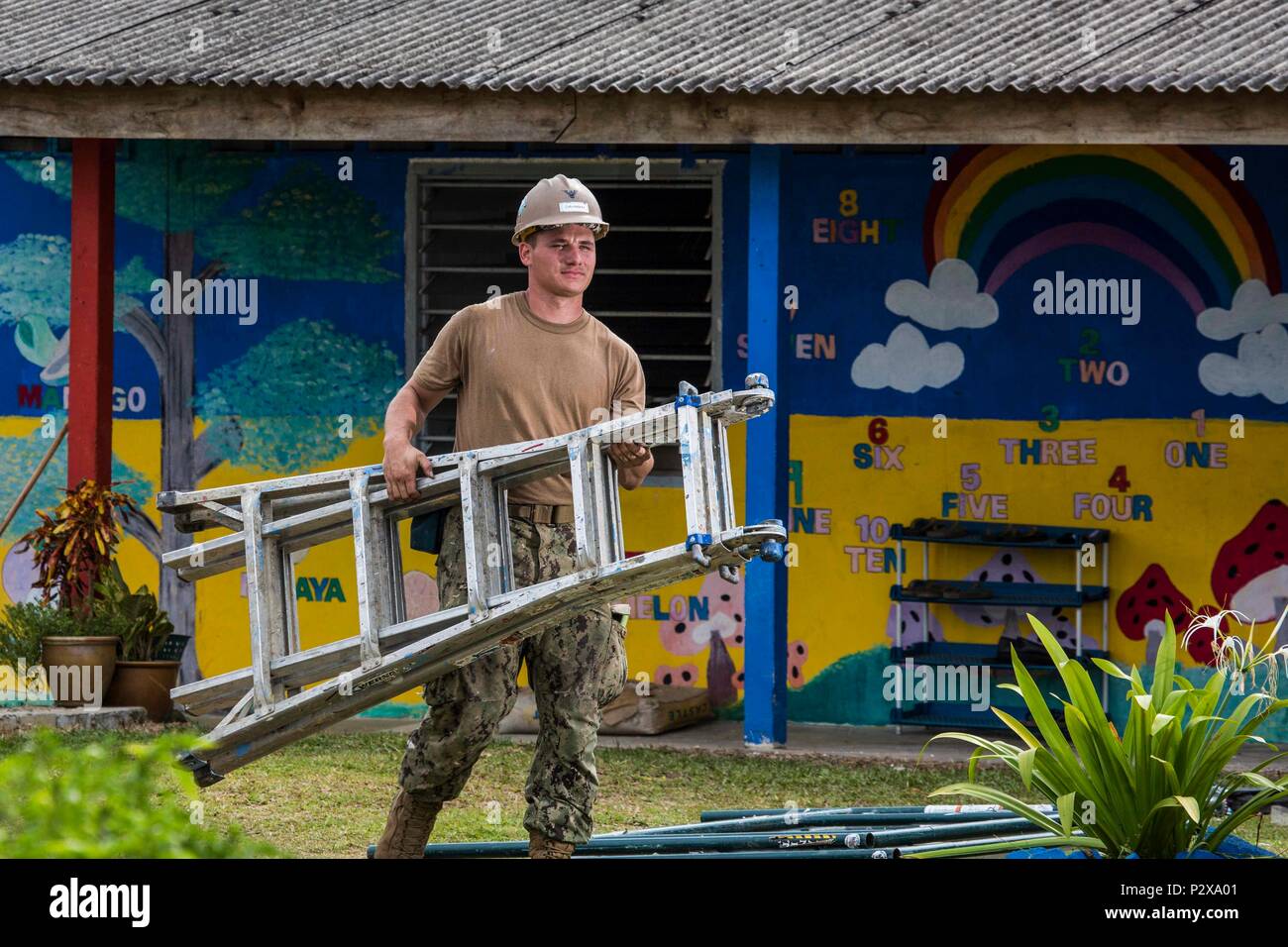 160804 N Cv785 160 Kuantan Malaysia Aug 8 2016 U S Navy Seabee Construction Electrician 3rd Class John Dahman Crew Leader Of The Tabika Kemas Felda Bukit Kindergarten Renovation Makes His Way Through The Worksite U S