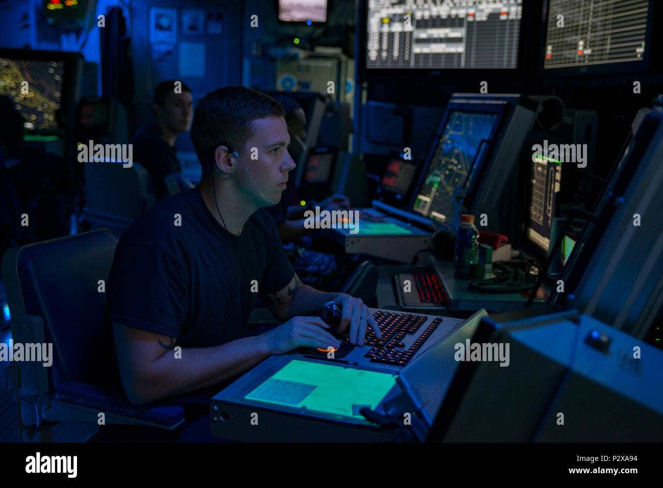 160807-N-WC455-004    ARABIAN GULF (Aug. 7, 2016) Air Traffic Controller 2nd Class Branden Culp-Henise, from York, Pa., controls the final approach and sequencing for aircraft recovery in the carrier air traffic control center (CATCC) of the aircraft carrier USS Dwight D. Eisenhower (CVN 69) (Ike). Ike and its Carrier Strike Group are deployed in support of Operation Inherent Resolve, maritime security operations and theater security cooperation efforts in the U.S. 5th Fleet area of operations. (U.S. Navy photo by Mass Communication Specialist Seaman Apprentice Joshua Murray/Released) Stock Photo