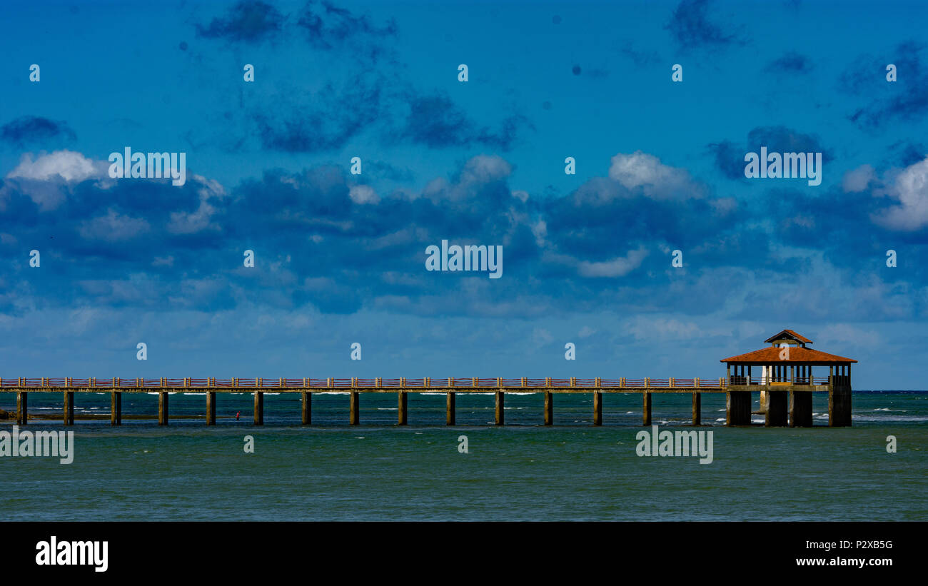 Jetty extending deep in the ocean Stock Photo Alamy