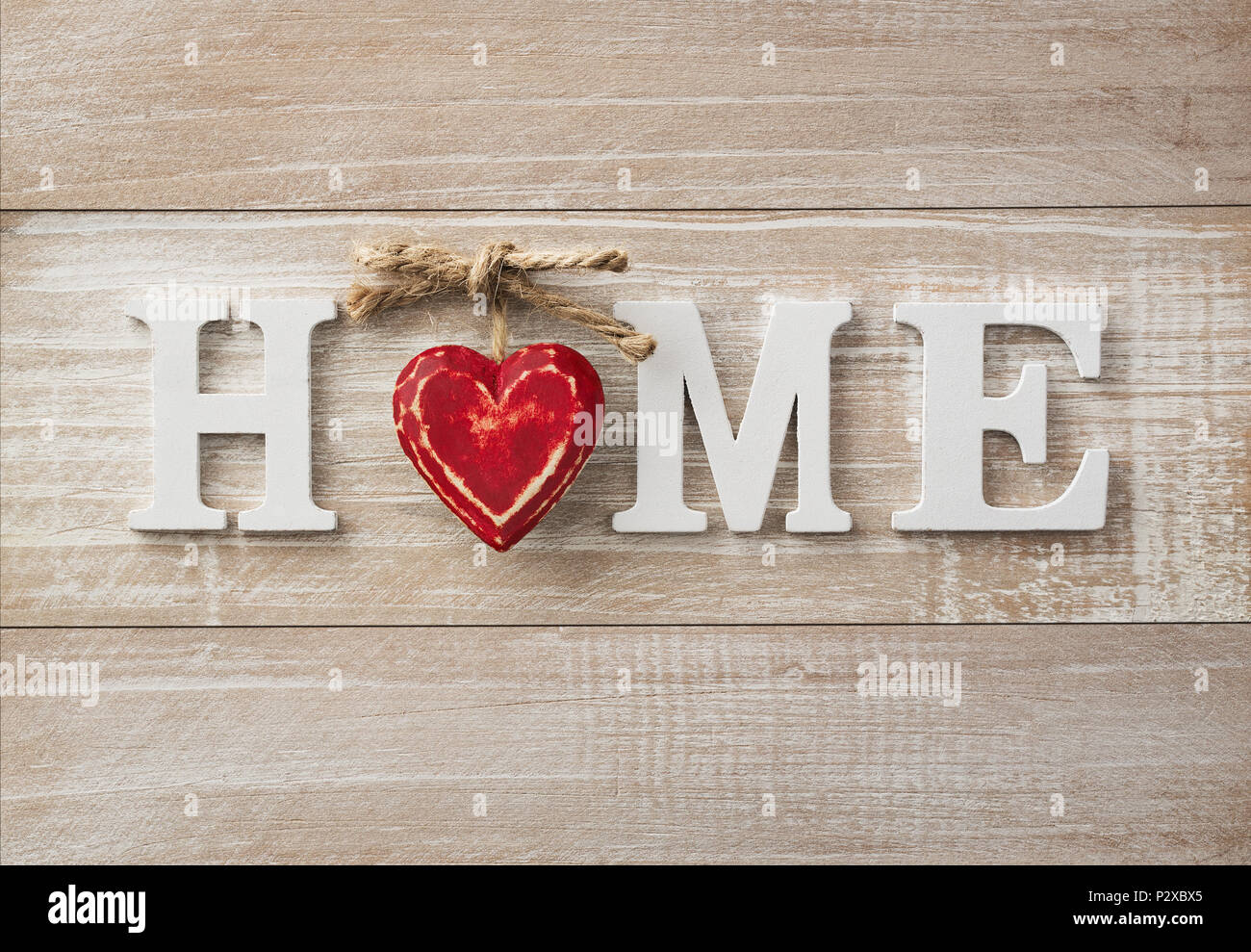 Home sweet home, wooden text on vintage board background with copy space Stock Photo