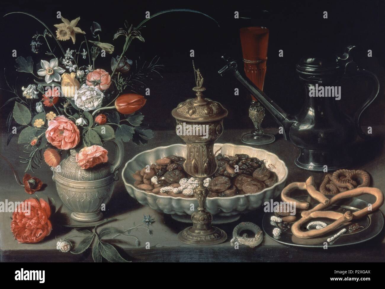 Still Life of Flowers and Dried Fruit - 1611 - 52x73 cm - oil on panel - Flemish school - NP 1620. Author: Clara Peeters (1594-c. 1657). Location: MUSEO DEL PRADO-PINTURA, MADRID, SPAIN. Also known as: MESA; BODEGON; BODEGON CON CARDO, FRANCOLIN, UVAS Y LIRIOS; NATURE MORTE AVEC TOURTE, POULETS ROTIS ET OLIVES; BODEGON DE HORTALIZA S (ZANAHORIAS, CARDO, NARANJA, LIMON... ). Stock Photo