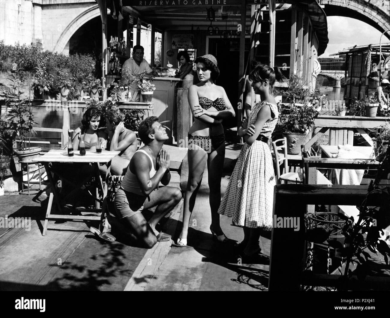 Original Film Title: POVERI MA BELLI.  English Title: POOR BUT BEAUTIFUL.  Film Director: DINO RISI.  Year: 1957.  Stars: RENATO SALVATORI. Credit: TITANUS / Album Stock Photo