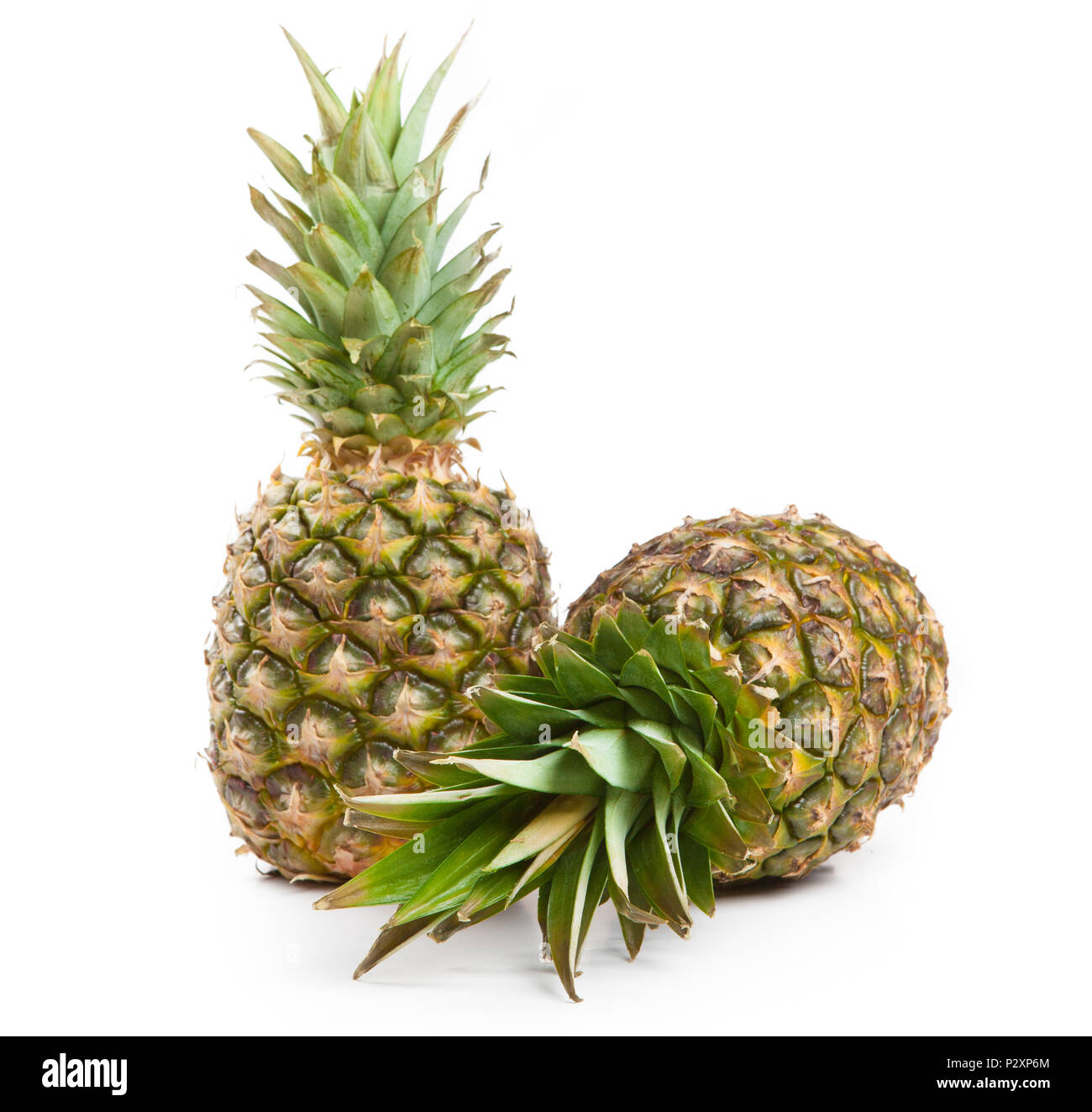 two big pineapples on a white background isolated Stock Photo