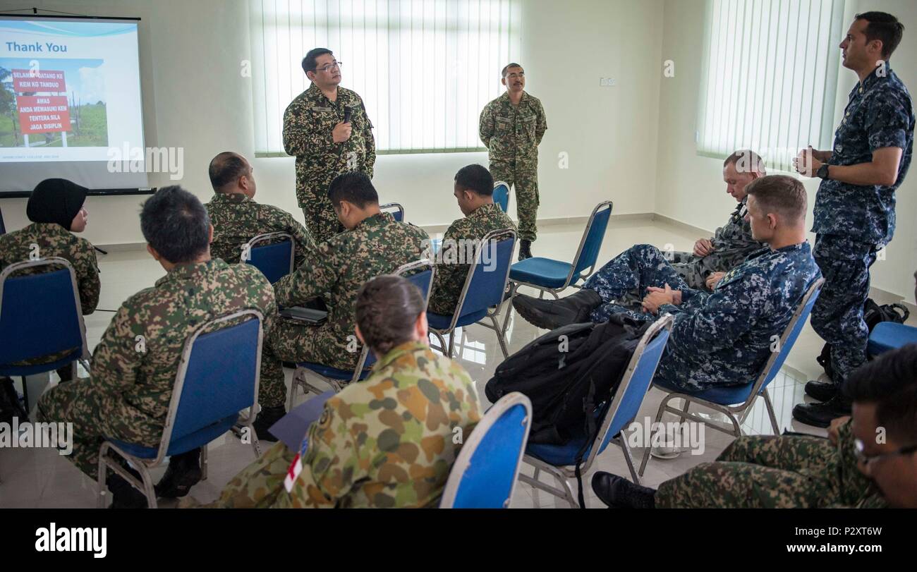 160811-N-QW941-305 KUANTAN, Malaysia (Aug. 11, 2016) Malaysian Army service members and Pacific Partnership 2016 personnel participate in a question and answer discussion during a Pacific Partnership operational medicine symposium. During the symposium, participants discussed mental health issues related to combat deployment, cardiology topics relative to operational platforms within diving, and Malaysian Armed Forces experiences with rapid medical response. This is the first time USNS Mercy (T-AH 19) and Pacific Partnership have visited Malaysia. During the mission stop partner nations are wo Stock Photo