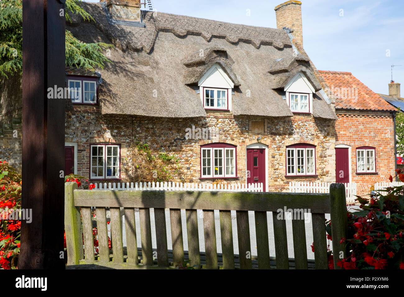 Thatched roof cottages in the village of Barton Bendish, west Norfolk