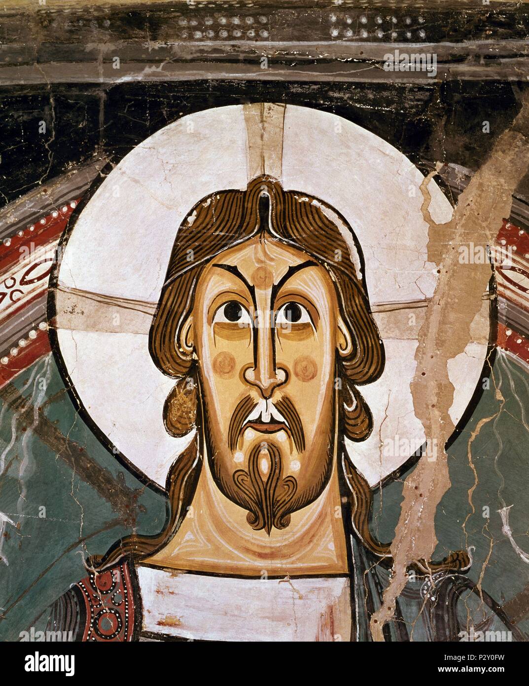 Christ's Face. Detail from the mural on the apse of San Clemente de Tahull. Romanesque art. Barcelona, Cataluna Museum of Art. Author: Master of Taüll (12th cent.). Location: MUSEU NACIONAL D'ART CATALUNYA, BARCELONA, SPAIN. Stock Photo