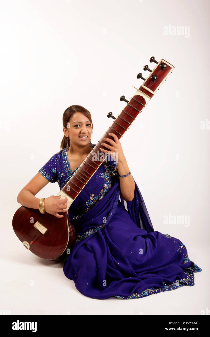 Sitar in playing position generic Stock Photo Alamy