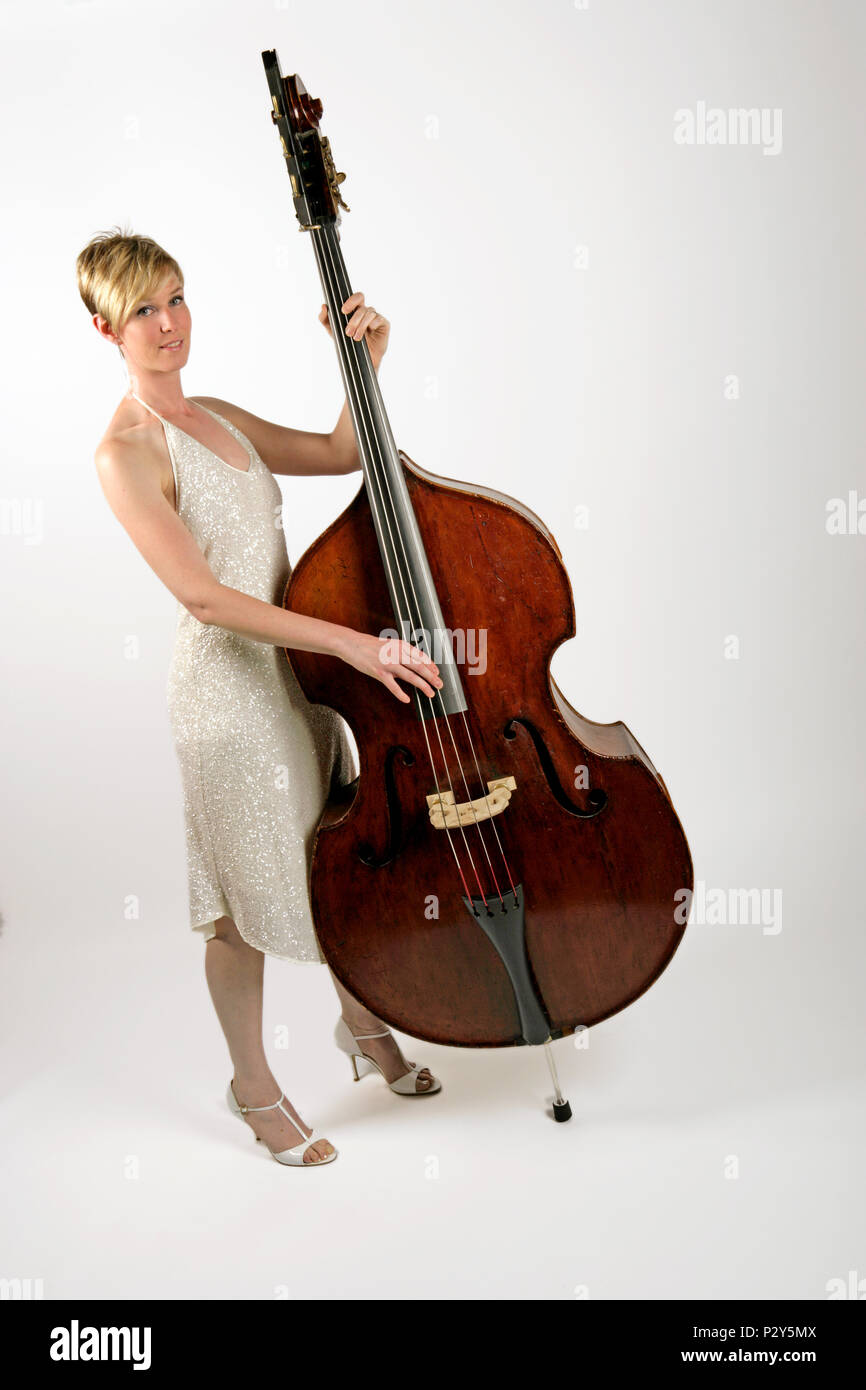 Female Double Bass player, playing pizzicato model release - Kylie Davies Stock Photo