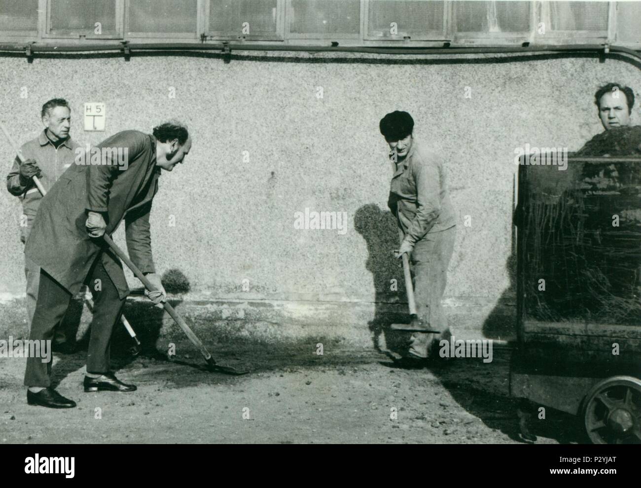 THE CZECHOSLOVAK  SOCIALIST REPUBLIC - CIRCA 1970s:  Retro photo shows workers cleaning the factory unit. Vintage  photography. Stock Photo
