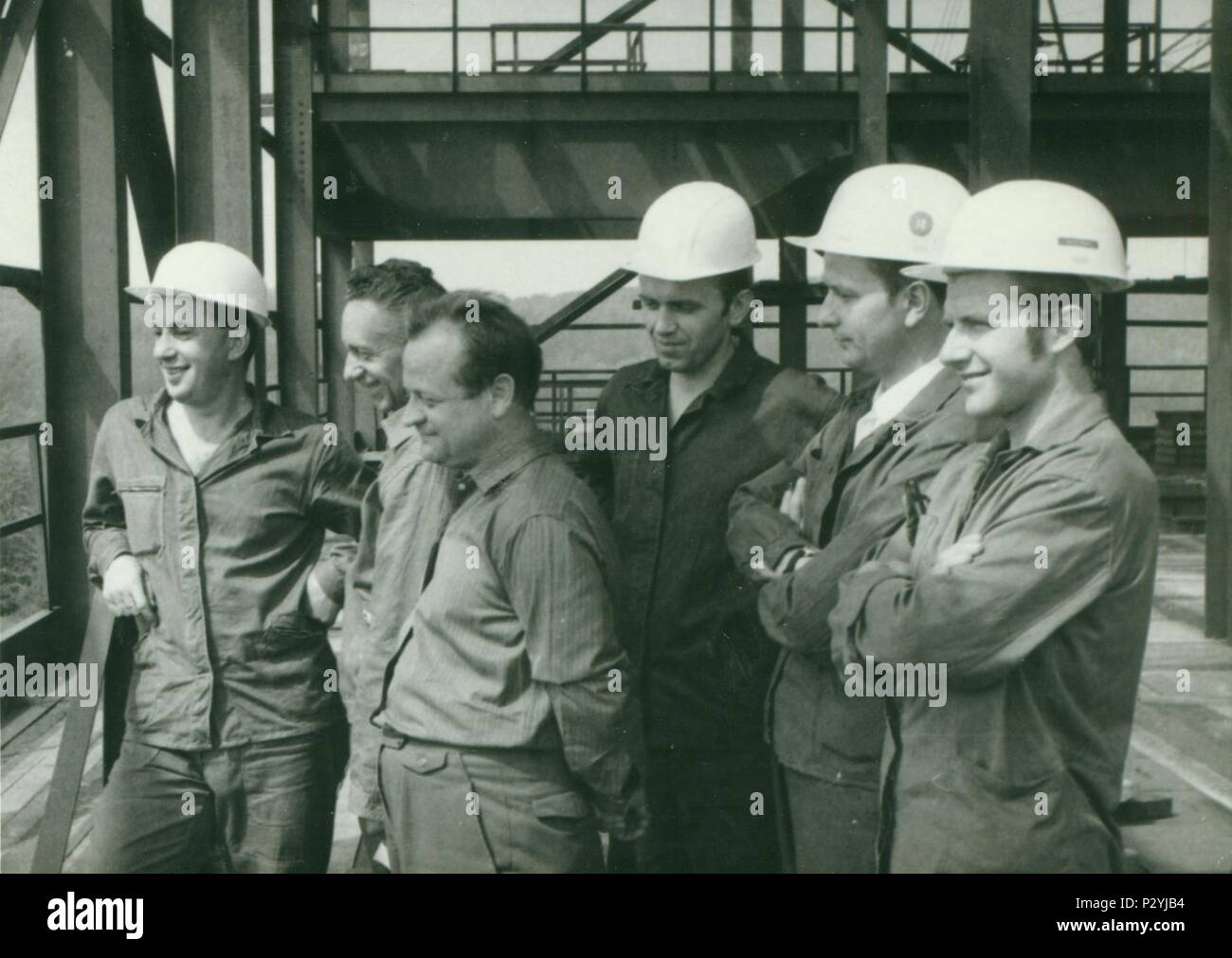 THE CZECHOSLOVAK  SOCIALIST REPUBLIC - CIRCA 1970s: Retro photo shows construction workers. Vintage  photography. Stock Photo