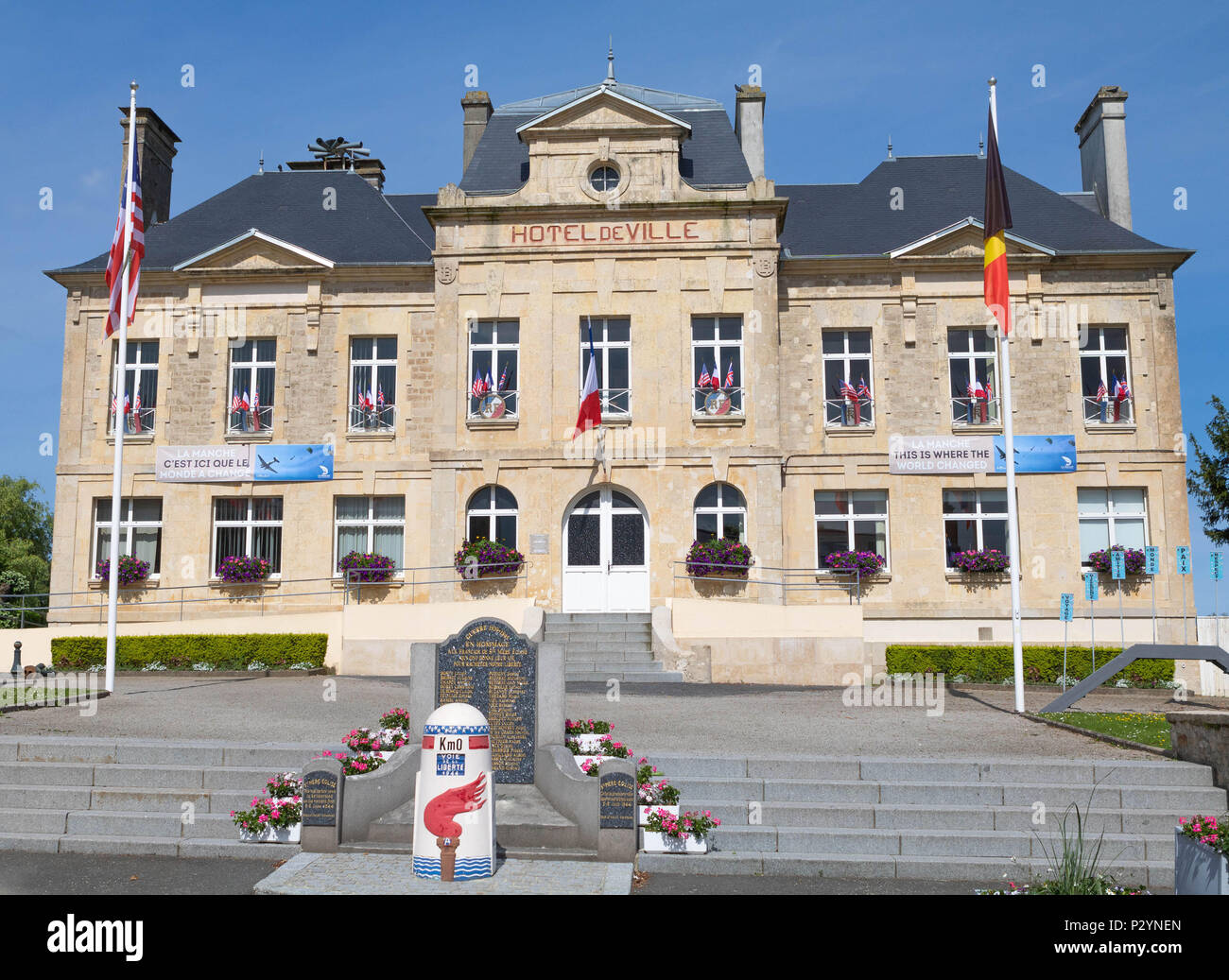 Sainte-Mere-Eglise, Normandy, France, June 16, 2018 Town Hall  of St Mere Eglise, which was the first town on the West Front liberated in 1944 Stock Photo