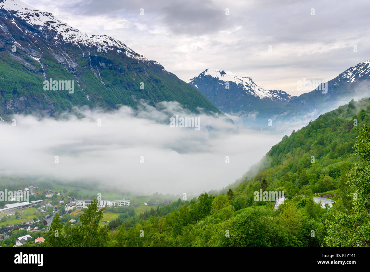 Foggy Geiranger fjord Norway- view from the end Stock Photo