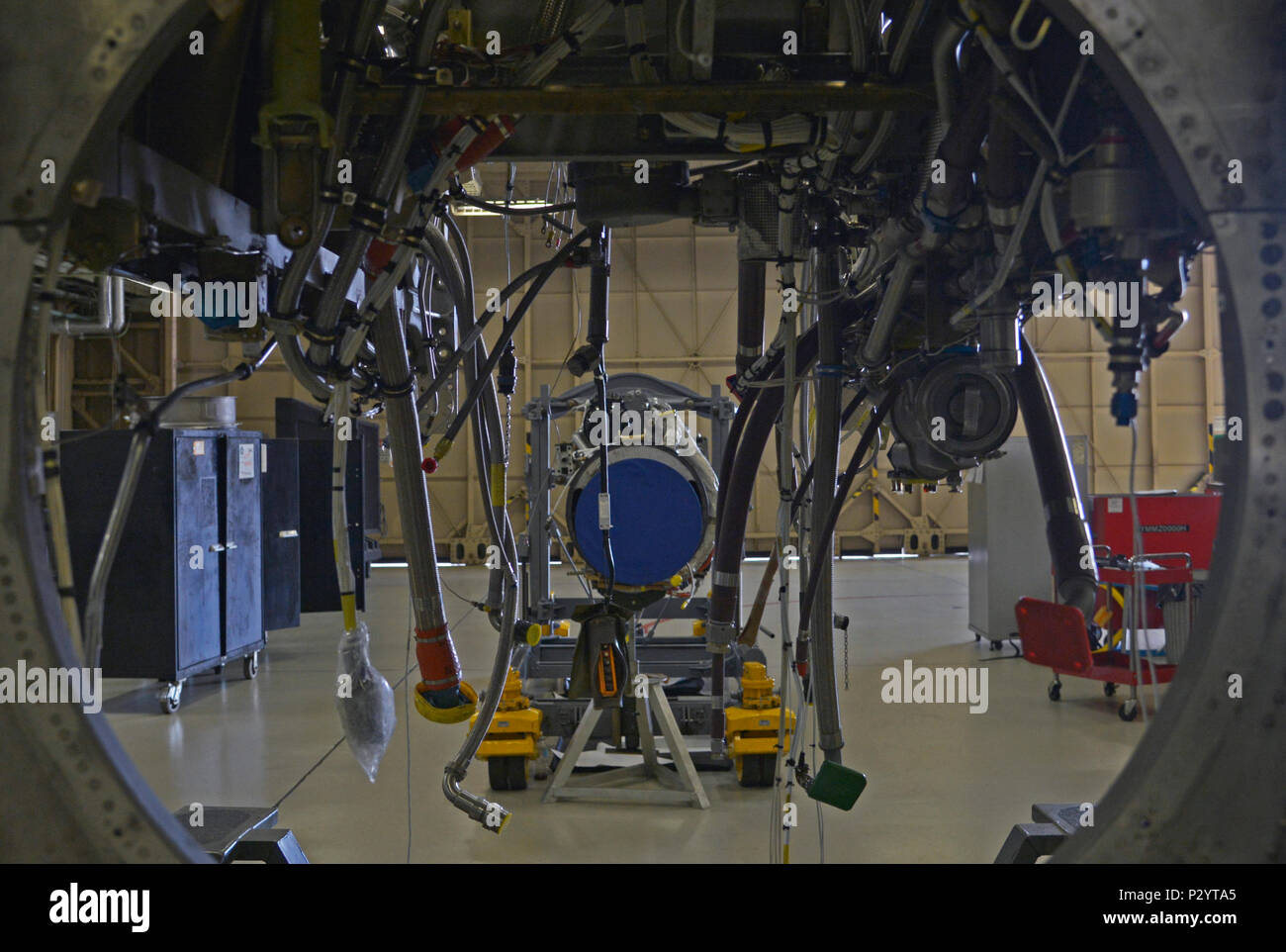 An engine and quick engine change kit sit in the 374th Maintenance