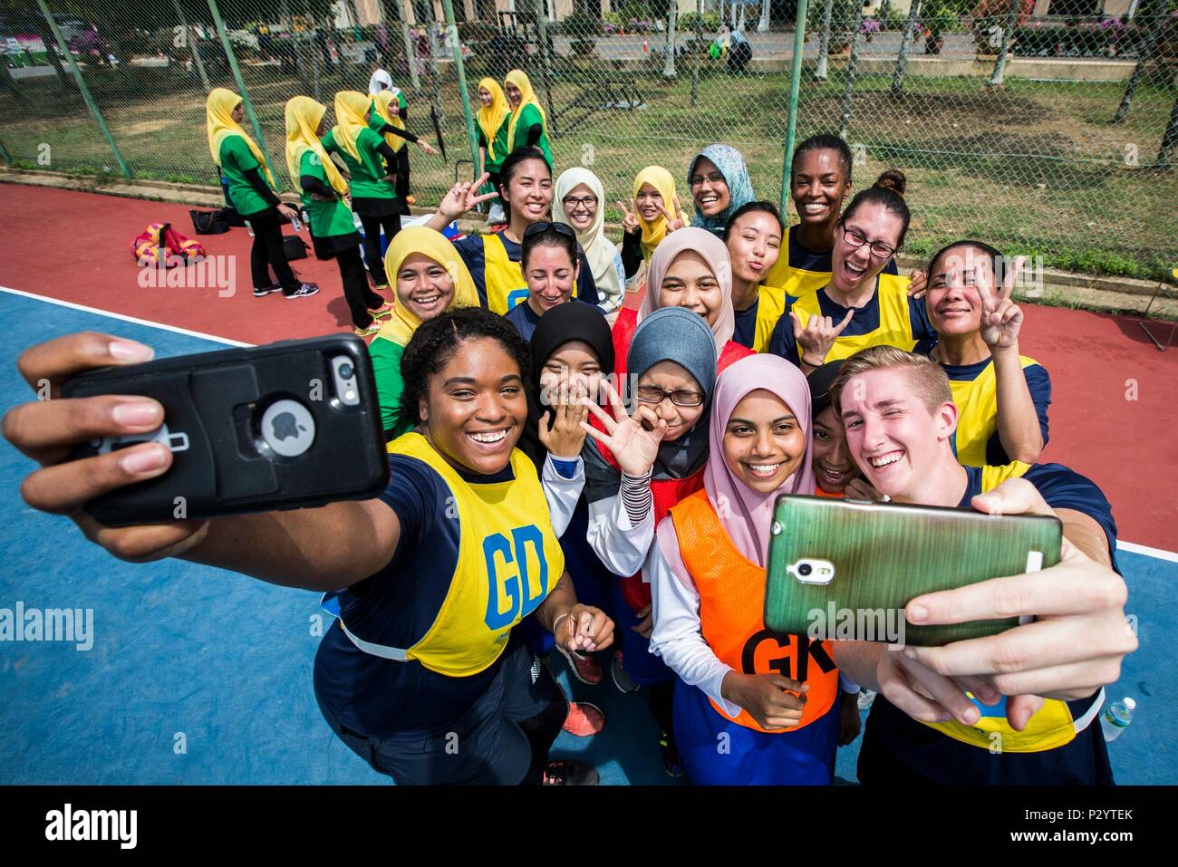 U.S. Navy personnel and students from the International Islamic 