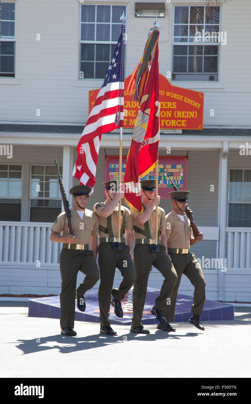U.S. Marines with 1st Marine Division, march on the colors during the ship naming ceremony for the USS John Basilone (DDG-122) on Camp Pendleton, Calif., August 16, 2016. (U.S. Marine Corps photo by Cpl. Tyler S. Dietrich) Stock Photo